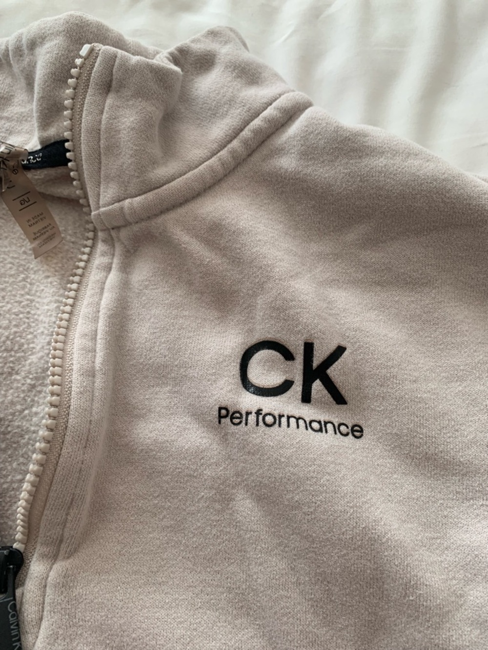 Calvin Klein Beige Sweatshirt with Black CK Performance Logo